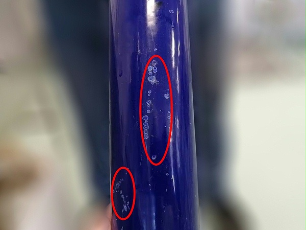 反应热产生的大量点状爆瓷图（画圈）